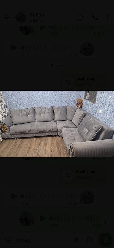 - Künc divan: L formalı, boz rəngli, yumşaq parça üzlü. Dərin