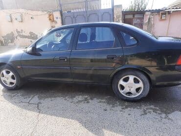 disko şar: Opel Vectra B modeli, tünd rəngdə sedan kuzov tipinə malikdir — 1