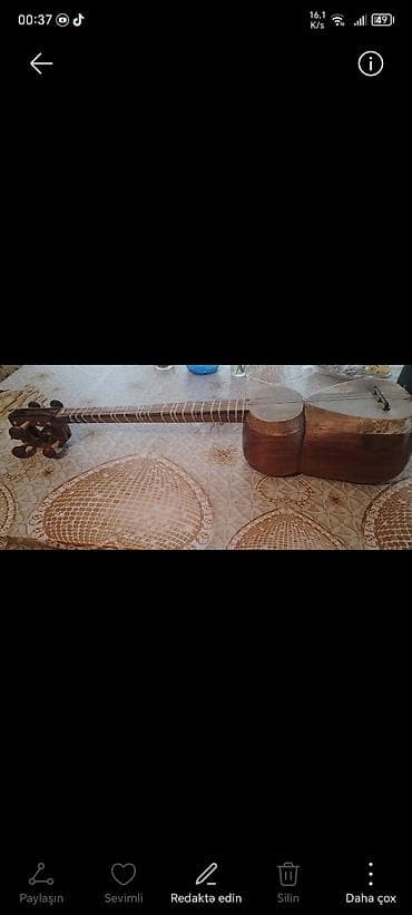 ox və kaman: Tar: Əl işı ilə hazırlanmış Azərbaycan tarı. Xüsusiyyətlər: - Korpus — 7