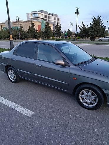 kia rio 2005: Kia Sephia: 1.6 l | 2003 il Sedan — 3