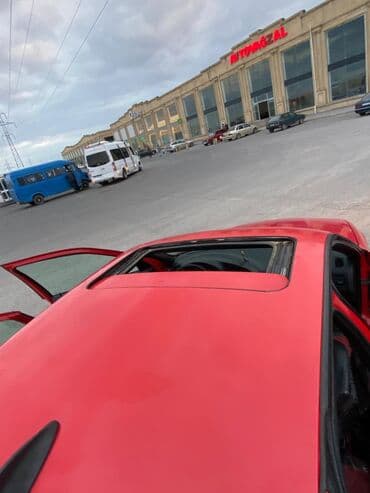 фольксваген пассат 1 8 турбо: Qırmızı rəngli sedan avtomobil Xüsusiyyətlər: - Korpus: 4 qapılı — 13