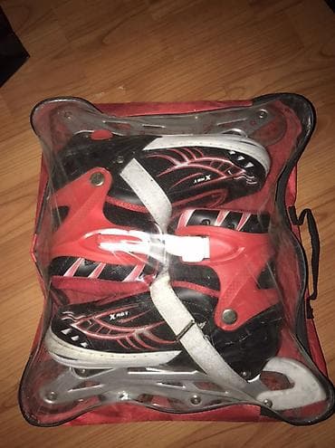 İdman üçün tənzimlənən inlayn konkis. - Rəng: qırmızı-qara, dekorativ