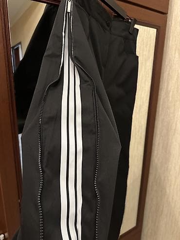 Paltolar: Qara rəngdə geniş kəsimli qadın şalvar. Yan hissələrdə başdan-başa — 3