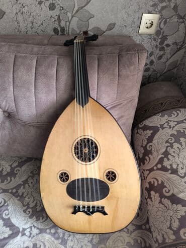 баян инструмент: Məhsul: Ud (Şərq simli musiqi aləti) Xüsusiyyətlər: - Korpus — 2