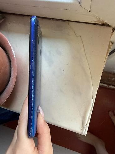 Техника и электроника: Redmi 7A, 32 ГБ, цвет - Синий, Отпечаток пальца — 3