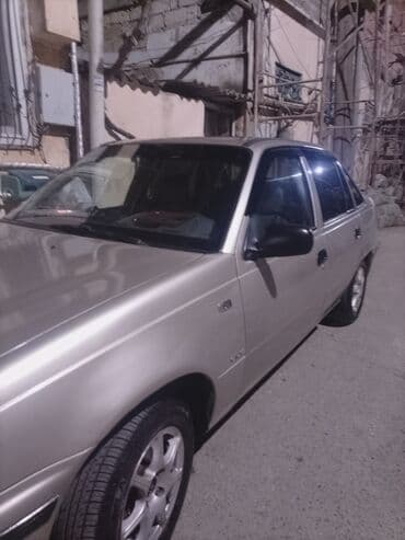 матиз 2 ош: Daewoo Nexia sedan - Kuzov: 4 qapılı sedan, gümüşü rəng - Nömrə — 6