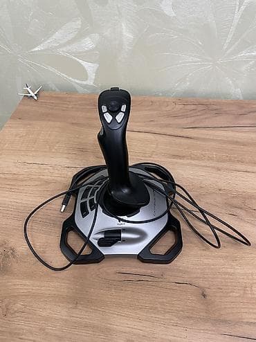 konsollar: Logitech extreme 3D pro joystick, aviasimulator ve ya ruchnik kimi — 1