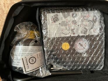 чемодан с инструментами для автомобиля: Tire Mobility Kit – avtomobil təkərini yolda tez bərpa etmək üçün — 2