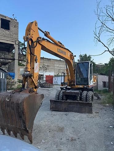 disk teker type 1 per page 40: Liebherr 904 təkərli ekskavator.İl 2000, işləmə saatı 27000, çox əla — 1