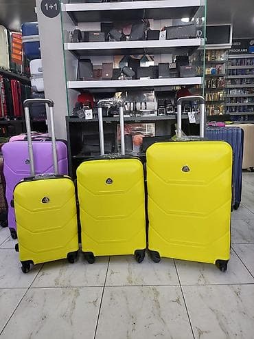 Sərnişinlər üçün 3 ölçüdə sərt korpuslu sarı çamadan dəsti - Korpus lalafo.az -da Sərnişinlər üçün 3 ölçüdə sərt korpuslu sarı çamadan dəsti - Korpus