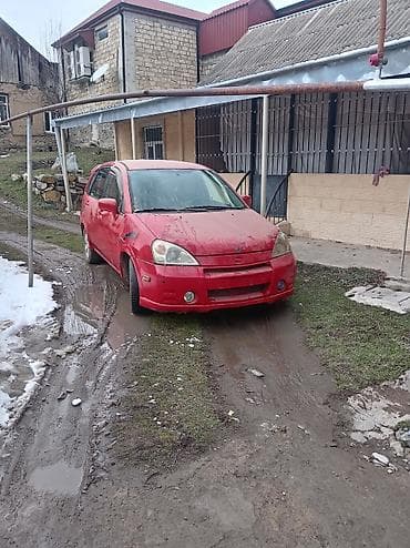lada baqaj: Suzuki Aerio hatchback – qırmızı rəng - Kuzov: 5 qapılı hatchback, tam — 6