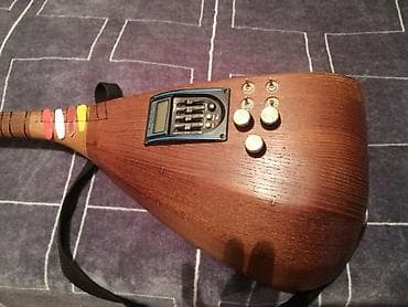 elektrik gitara: Elektrikləşdirilmiş saz – fərdi yığımdır - Korpus: tam ağac (tünd — 8