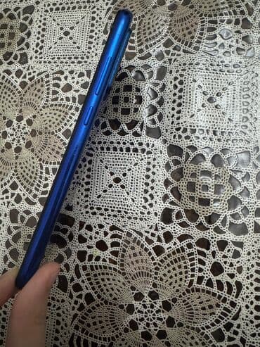 şirə çəkən: Xiaomi Redmi smartfon - Model: Redmi (mavi korpus) - Ekran: Tamölçülü — 3