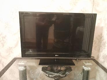 Смарт ТВ приставки: LG LED/LCD televizor - Ekran diaqonalı: təxminən 32" - Rəng: qara — 1