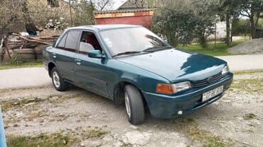 lider disk təkər: Mazda 323: 1.6 l | 1994 il Sedan — 3
