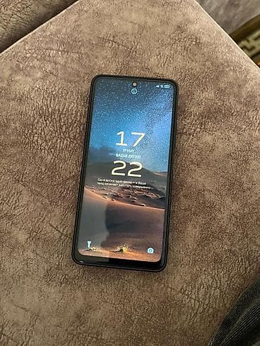 bluetooth qulaq: Redmi smartfon - Model: Redmi (arka qapaqda “Redmi” loqosu və “108MP” — 3