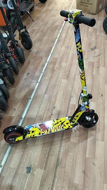 bas gitara: Uşaq üçün elektrik skuter – rəngarəng “graffiti” dizayn surət 16 kilo — 1