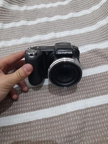 Olympus SP-600UZ rəqəmsal fotoaparat evde galib 1-2 ay. isteyib