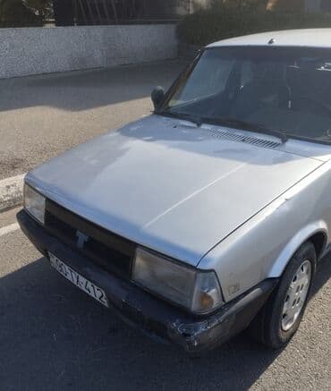 tofaş satış: Tofaş Şahin/Doğan (sedan) – gümüşü rəng Xüsusiyyətlər: - Kuzov: 4 — 3