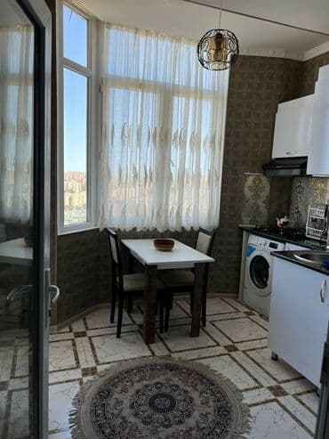 mingecevirde satilan menziller: 2 otaqlı, Yeni tikili, m. Əhmədli, 54 kv. m — 9