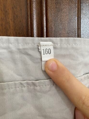 şortik tulum: Bej rəngli kombinezon.1dəfə geyinilib.təzədir.12-13yaş üçün uyğundur — 2