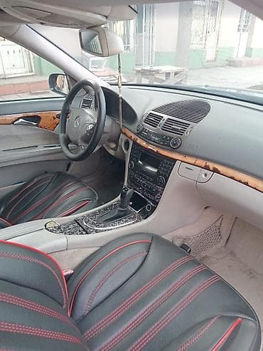 merse: Mercedes-Benz E‑Sinfi sedan (W211 kuzov), tünd mavi rəng. 2.7 cdi — 8