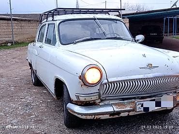 Model: GAZ Volqa (klassik sedan) Kuzov: 4 qapı, ağ rəng Sükan: sol