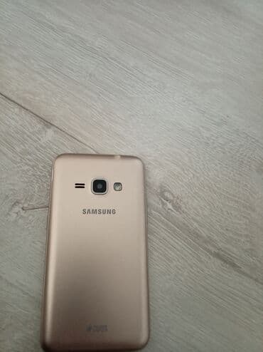 Техника для кухни: Samsung Galaxy J1 Duos, 2 ГБ, цвет - Золотой, Две SIM карты — 4