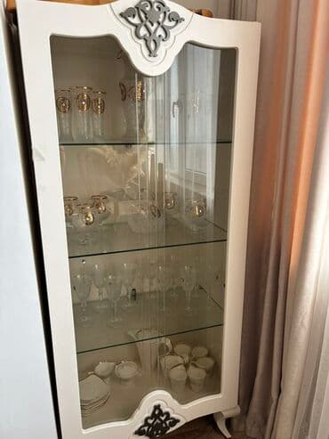 Şüşəli dolab vitrini, İşlənmiş, Ünvandan götürmə