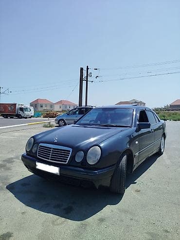 azsamand diski: Mercedes-Benz E-Class (W210) sedan - Korpus: 4 qapılı sedan, tünd — 1