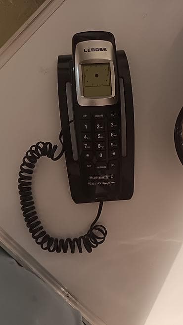 telephone: LEBOSS stolüstü/çininə asılan simli telefon Xüsusiyyətlər: - Model — 1