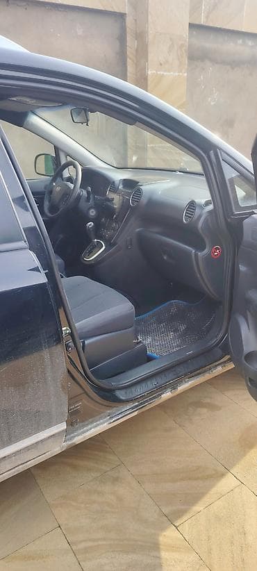 masin alqi satqisi: Kia Carens (interyer və eksteryer) - Salon: qara parça oturacaqlar — 4