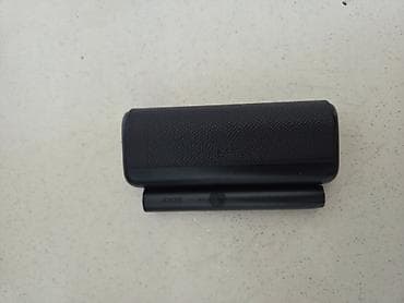 şexsi eşyalar: IQOS ILUMA prime - Model: IQOS stick və daşınan şarj qabı — 2