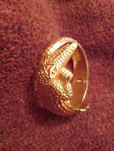 Очки: Qizil suyunda rengi getmiyen polad timsah formasında qolbaqi.cox — 4