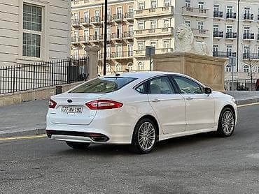 dinamo ford focus: Ford Fusion sedan – ağ rəng, 4 qapı, ön ötürücülü. Xüsusiyyətlər: - — 5