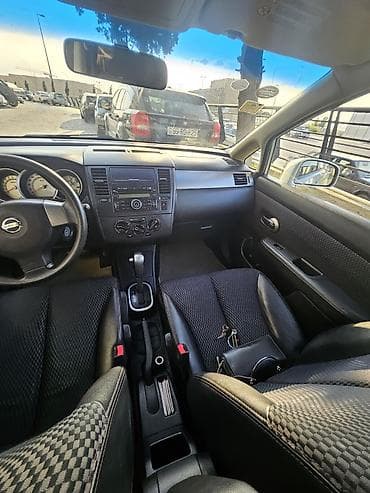 benzin bakı: Nissan Tiida: 1.6 l | 2008 il Sedan — 9