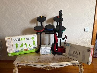 Nintendo Wii: Nintendo Wii komplekt dəsti Tərkibi: - Nintendo Wii (ağ) konsol - — 1