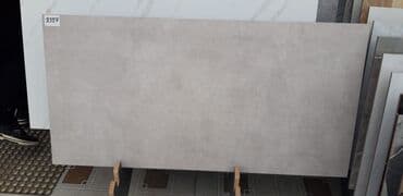 ucuz radiatorlar: Boz rəngli, uzunsov formalı keramik plitə. Bu plitə müasir və — 1