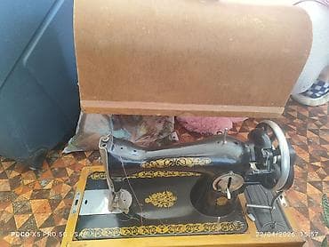 Mexaniki tikiş maşını – klassik model, əl ilə fırladılan volanlı