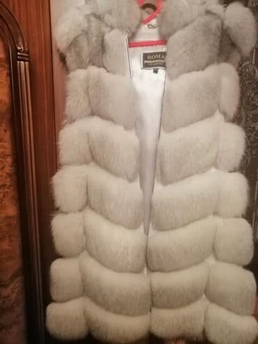 Tebii pesec kapişonlu. İdeal veziyetdedir. Песец в идеальном состоянии