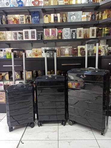 yol cantası: Material polikarbonat.S-50azn. M-80azn. L-110azn Camadan — 1