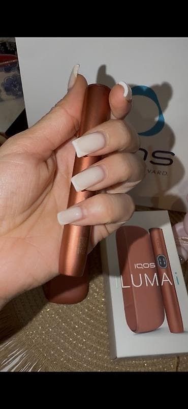IQOS ILUMA – tütün çubuqları üçün qızdırma cihazı (mis-bürünc rəng)