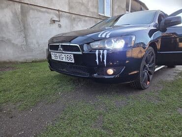 mitsubişi pajero: Mitsubishi Lancer: 2 l | 2008 il 279300 km Sedan — 2