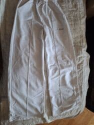 Ağ rəngli geniş kəsimli şalvar. - Kumaş: yumşaq trikotaj/parça (idman