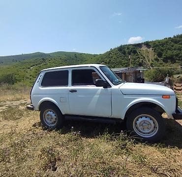 nissan tiida yan guzgu: VAZ (LADA) 4x4 Niva: 1.7 l | 1999 il 153624 km Sedan — 4