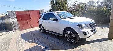byd qara: Mercedes-Benz ML-Class (W164) ağ rəngdə SUV - Kuzov: ağ, 5 qapı — 2