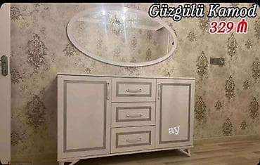 Güzgülü kamod - Rəng: ağ-gümüş çalarlı - Dizayn: yumşaq xətli, müasir