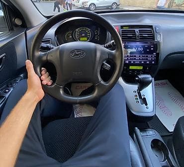 Hyundai Tucson: 2 l | 2008 il Ofrouder/SUV — 9