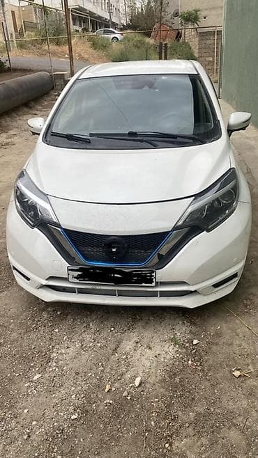 06 diskleri: Nissan Note e-POWER, ağ rəng, 5 qapılı hatchback. Əsas xüsusiyyətlər — 1