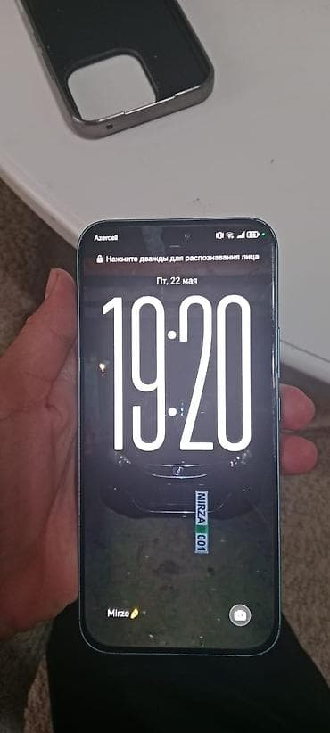 dinamikleri: Məhsul: Mavi rəngdə smartfon + qoruyucu keyfiyyətli örtük (şəkillərdə — 3